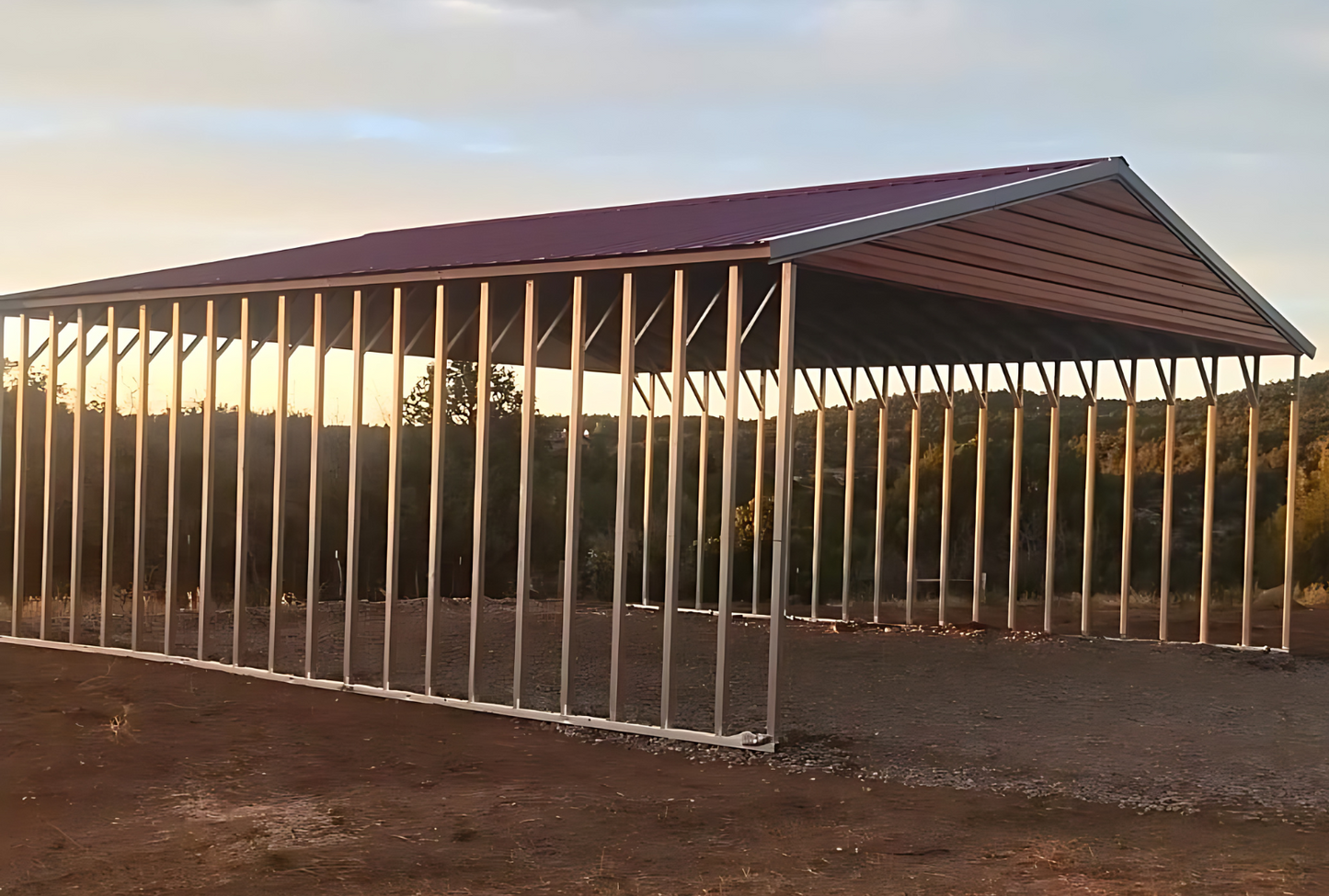 Side angle of 30x40 steel A-frame shelter showcasing durable open design and sturdy framing