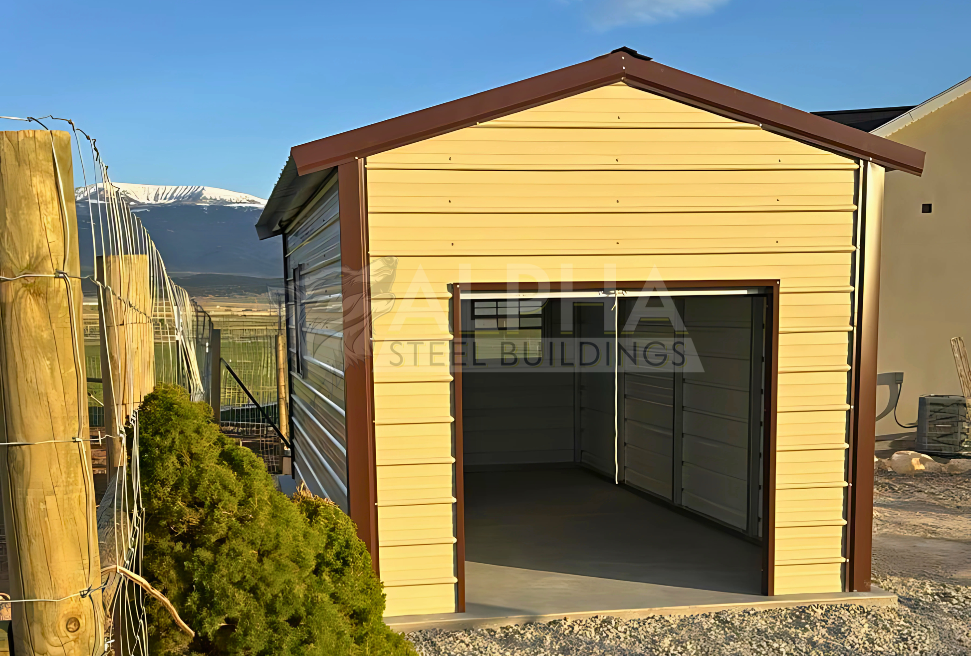 Back right angle view of 10'x20'x8' a-frame style vertical roof steel storage shed, closed on both sides and the ends, with one walk in door, two windows & one 6' x 6' roll-up door.