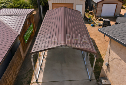 Elevated roof view of a 12x20x8 regular style steel carport showing the horizontal metal roof and open-sided steel frame.