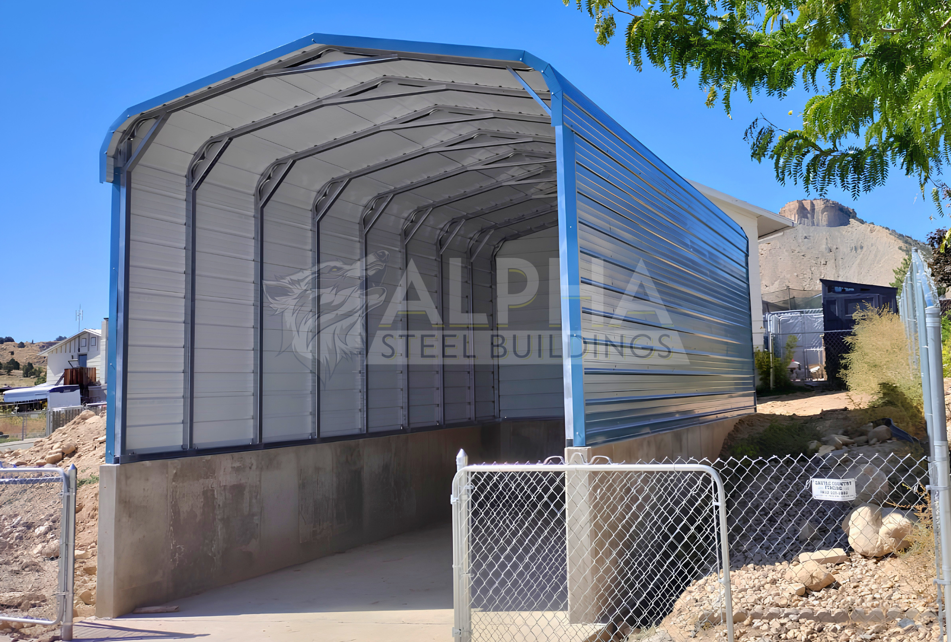 Front right angle close up view of 18'x25'x8' regular style horizontal rv cover - built on stem wall for extra height, closed on three sides.