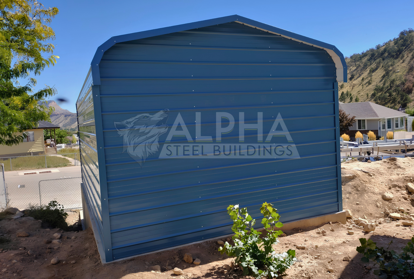 Rear side view of 18'x25'x8' regular style horizontal rv cover - built on stem wall for extra height, closed on three sides.