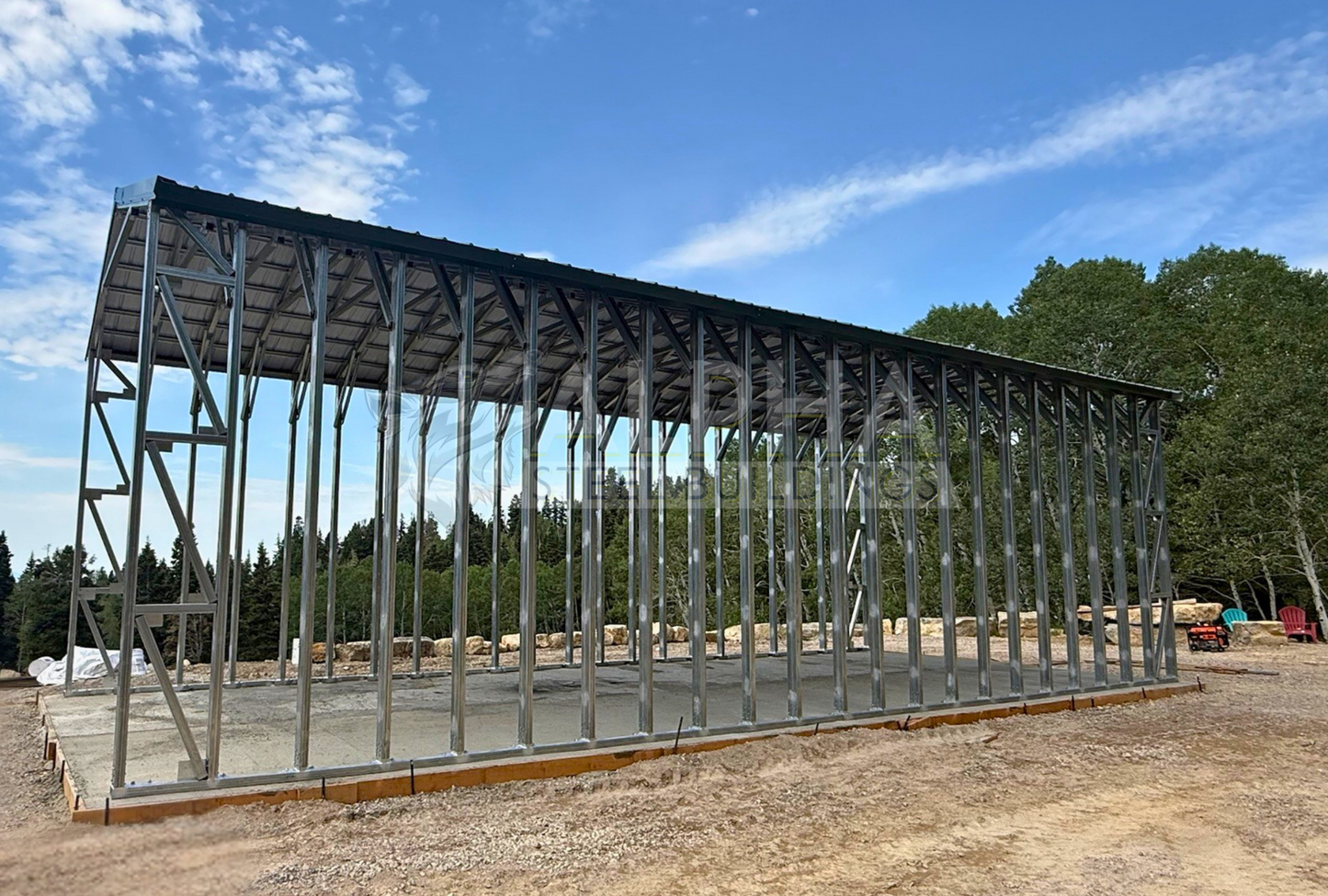 18'x44'x13' A-frame steel carport side view with vertical roof, open framing, and heavy-duty 14-gauge steel structure.