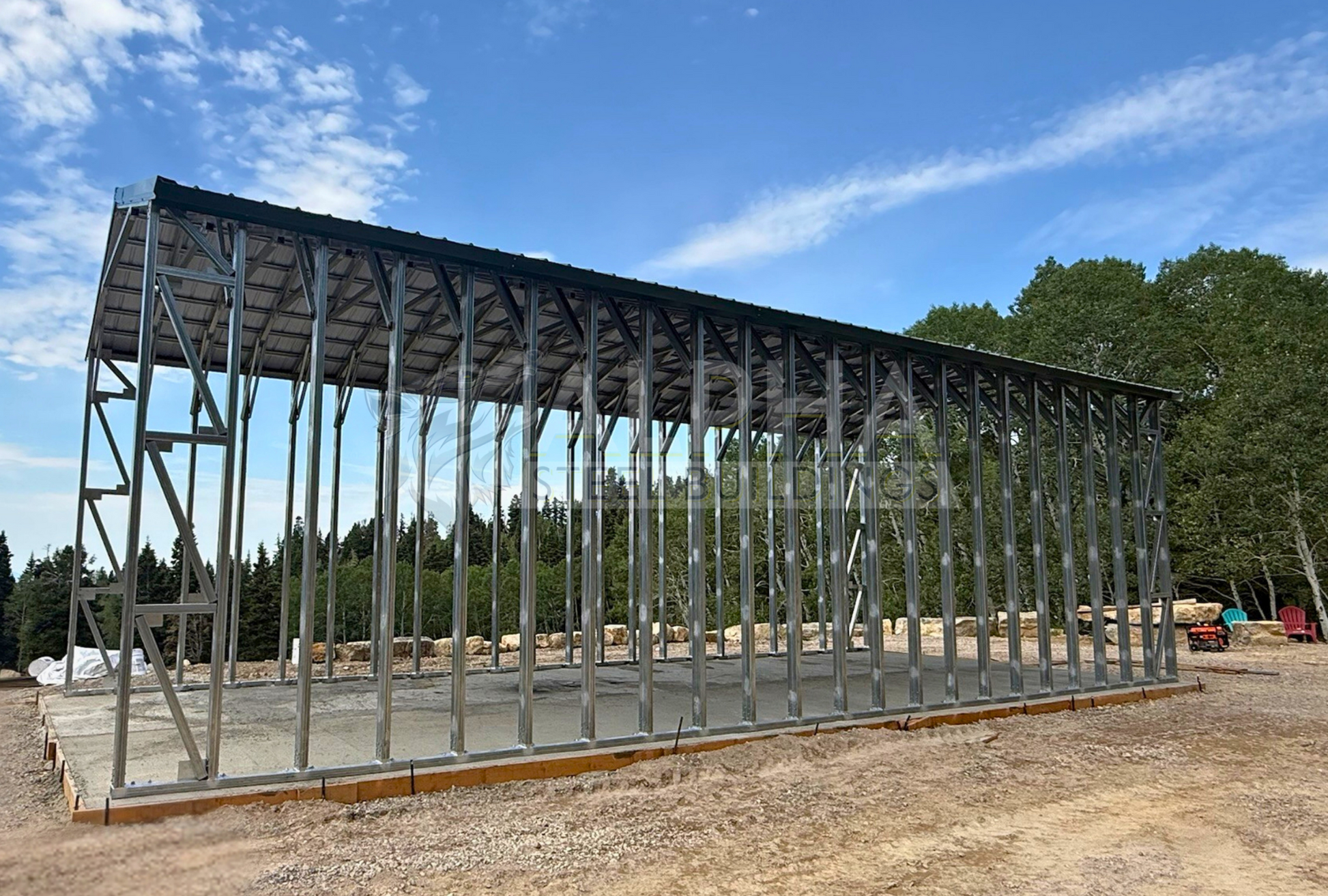 18'x44'x13' A-frame steel carport side view with vertical roof, open framing, and heavy-duty 14-gauge steel structure.