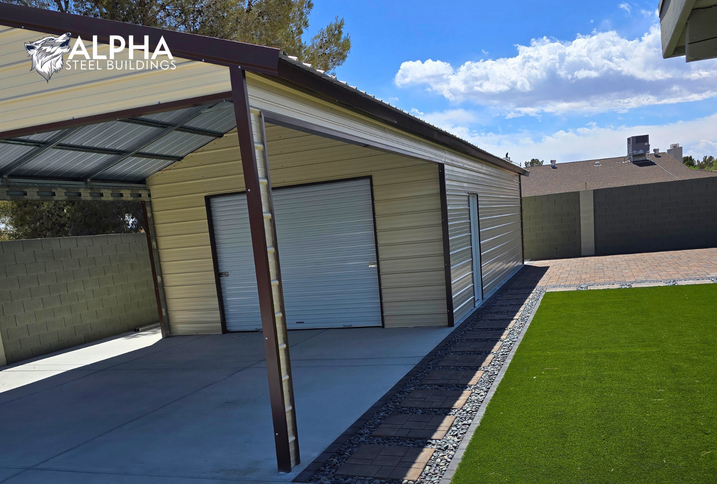 Front right angled view of 18x55x9 A-frame steel garage with vertical roof, enclosed sides, and large front-side frame-out openings.