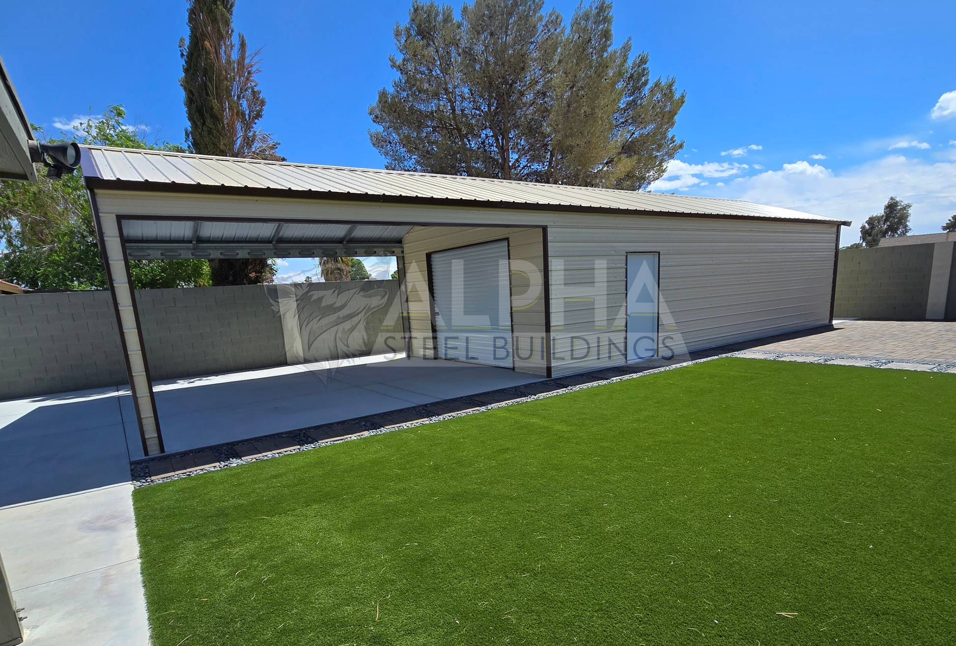 18x55x9 vertical roof steel garage wide side view with open covered section and enclosed storage area