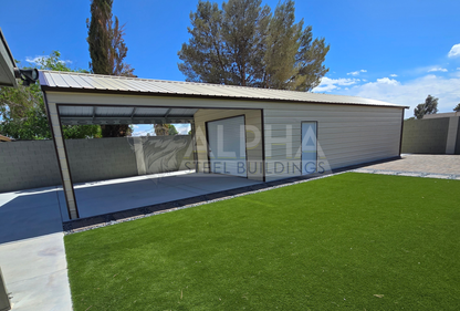 18x55x9 vertical roof steel garage wide side view with open covered section and enclosed storage area