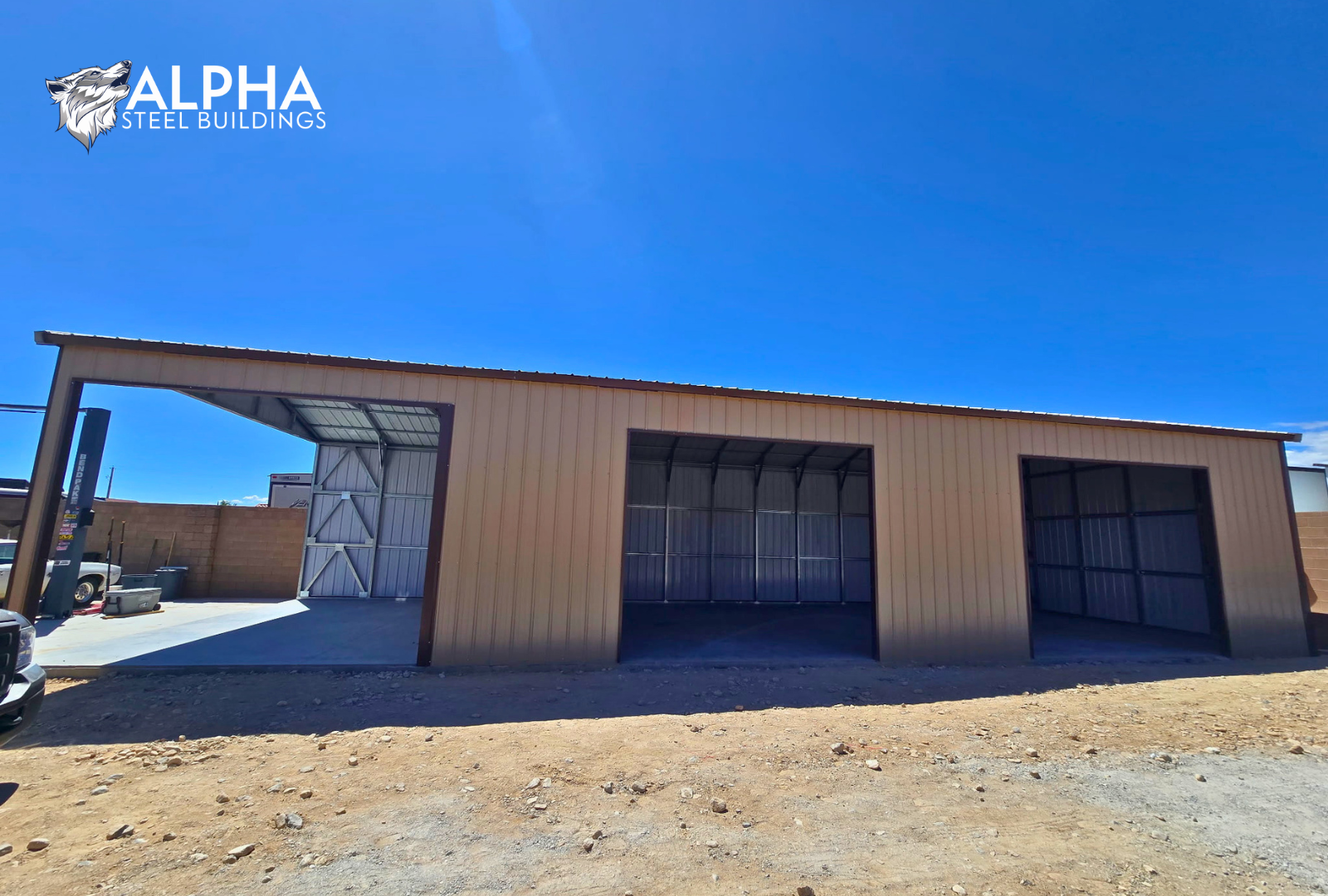 Right view of 22x60x12 A-frame utility building with vertical roof, fully enclosed sides, and three framed bay openings on the right wall.