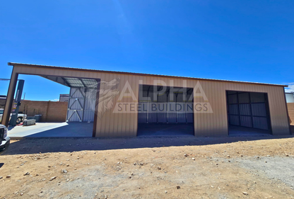 Right view of 22x60x12 A-frame utility building with vertical roof, fully enclosed sides, and three framed bay openings on the right wall.