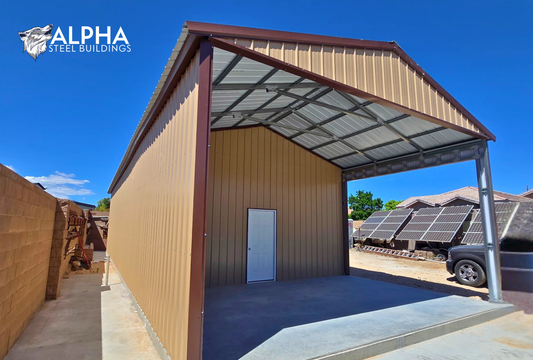 Front left angled view of 22x60x12 A-frame utility building with vertical roof, partially enclosed front, and side wall with vertical panels.