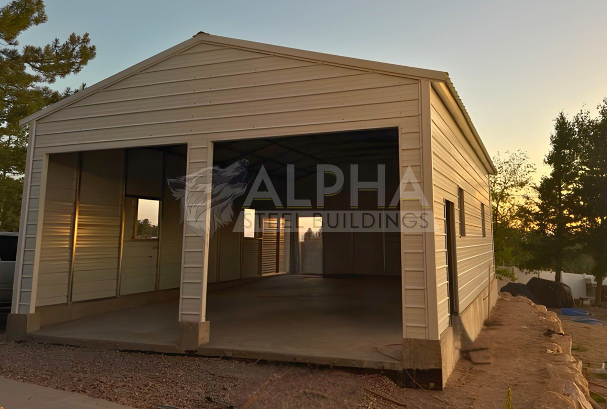 Front-right angle of a 24x35x11 vertical roof steel garage with horizontal wall panels and two overhead door frame-outs.