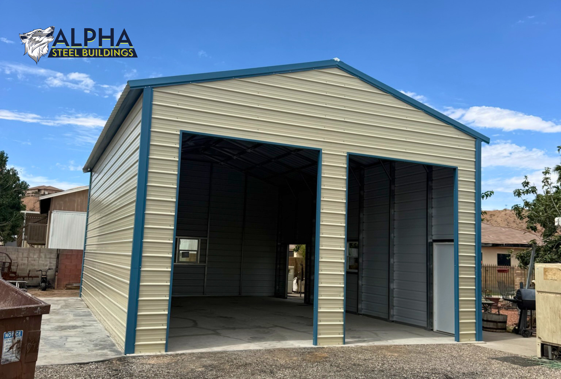 Front view of a 24'x35'x14' vertical roof steel garage with dual overhead door openings, horizontal metal panels, and an enclosed A-frame design.