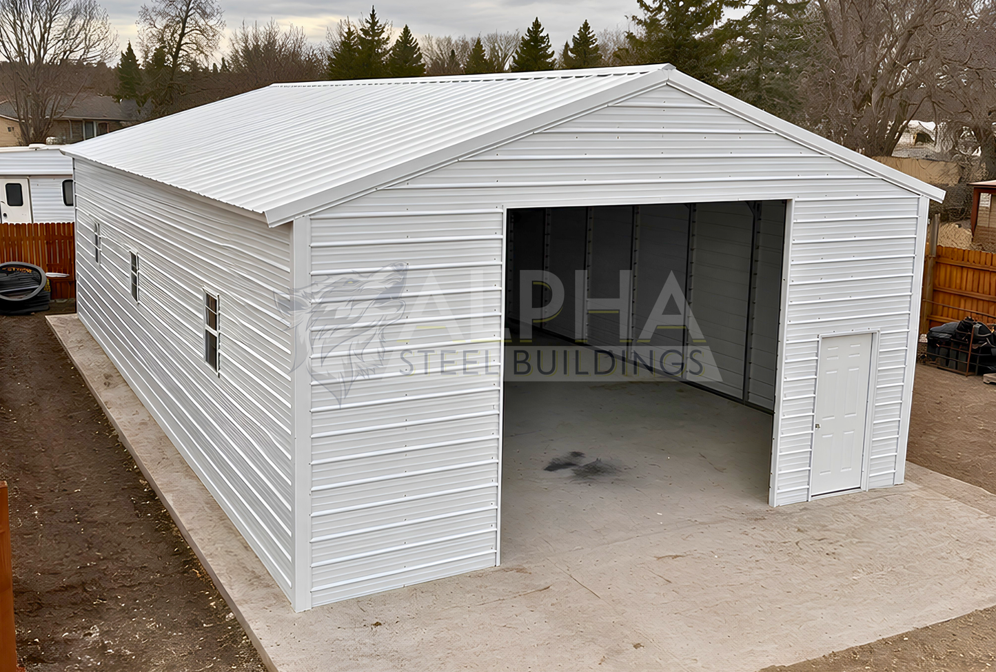 26x60x12 vertical roof steel garage elevated front view with 12x12 overhead door frame-out, walk-in door, and windows