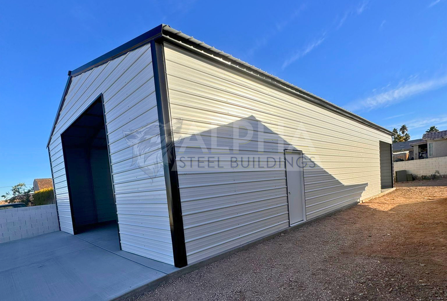 Front right angle close up view of 30' x 60' x 12' a-frame steel building with a vertical roof, fully enclosed on both sides and ends for secure storage and weather protection.