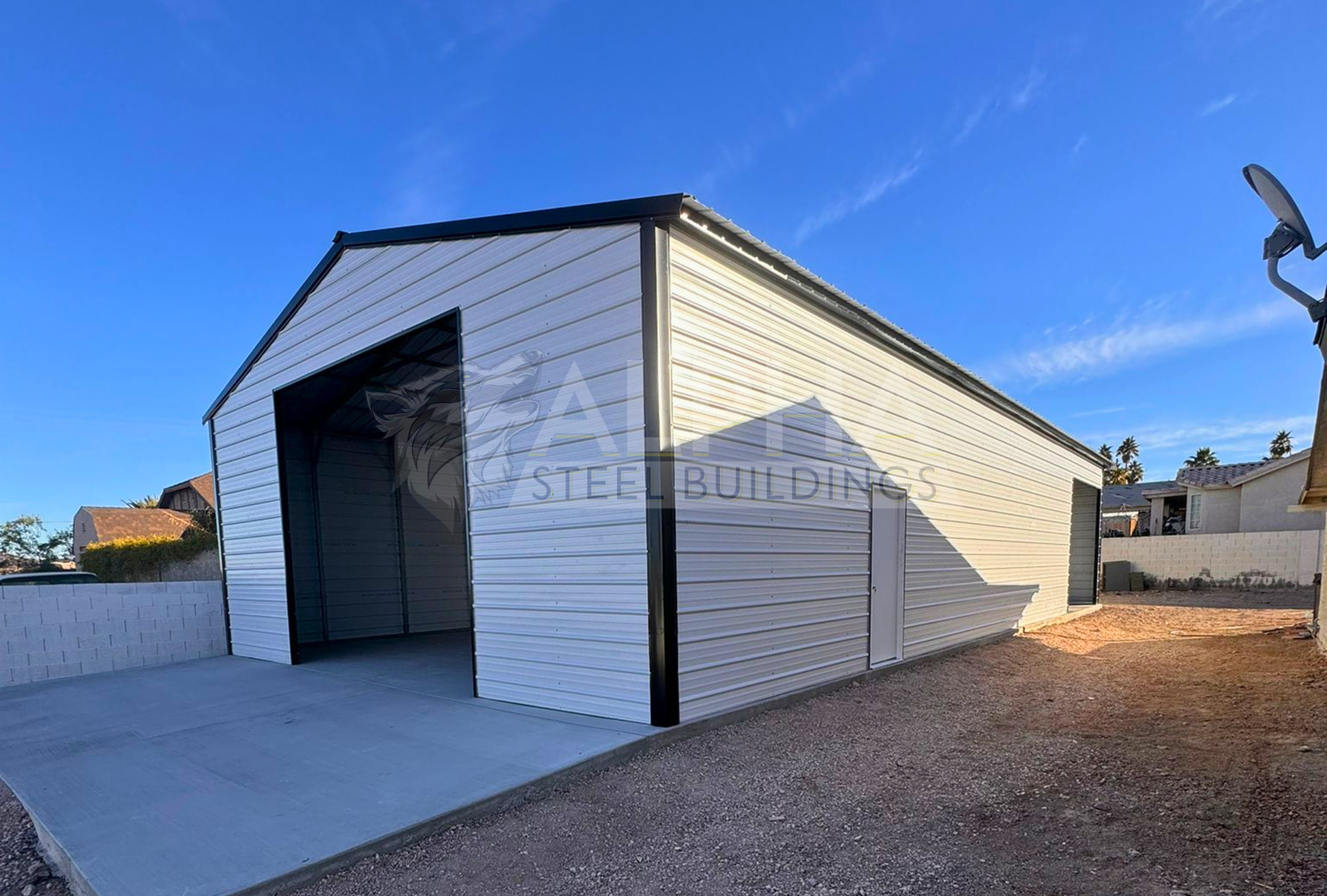 Front right angle view of 30' x 60' x 12' a-frame steel building with a vertical roof, fully enclosed on both sides and ends for secure storage and weather protection.