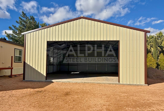 Front view of 30x30x12 A-frame steel garage with vertical roof, enclosed end wall, 18x10 overhead door frame-out, windows, and walk-in door