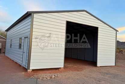 30x40 A-frame steel garage with vertical roof shown from the front left angle, fully enclosed with windows and 12-foot height.