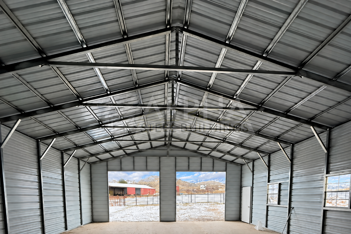 30'x40'x11' A-frame vertical roof steel shop interior front view showing steel framing and overhead door openings