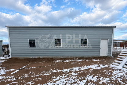 30'x40'x11' A-frame vertical roof steel shop side view with windows and walk-in door