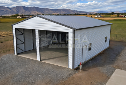 30x40x13 A-frame steel building with vertical roof, two 12x12 overhead door frame-outs, walk-in door and windows, elevated front right view