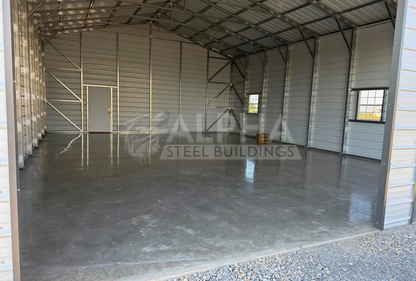 30x40x13 A-frame steel building with vertical roof, diagonal bracing and concrete floor, interior view