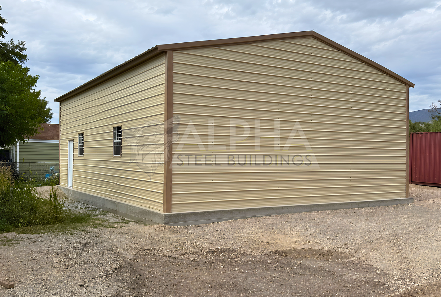 30x40x13 A-frame steel garage with vertical roof, 36" x 80" walk-in door and (2) 30" x 36" windows on the right side, fully enclosed back end with horizontal panels, back right angled view