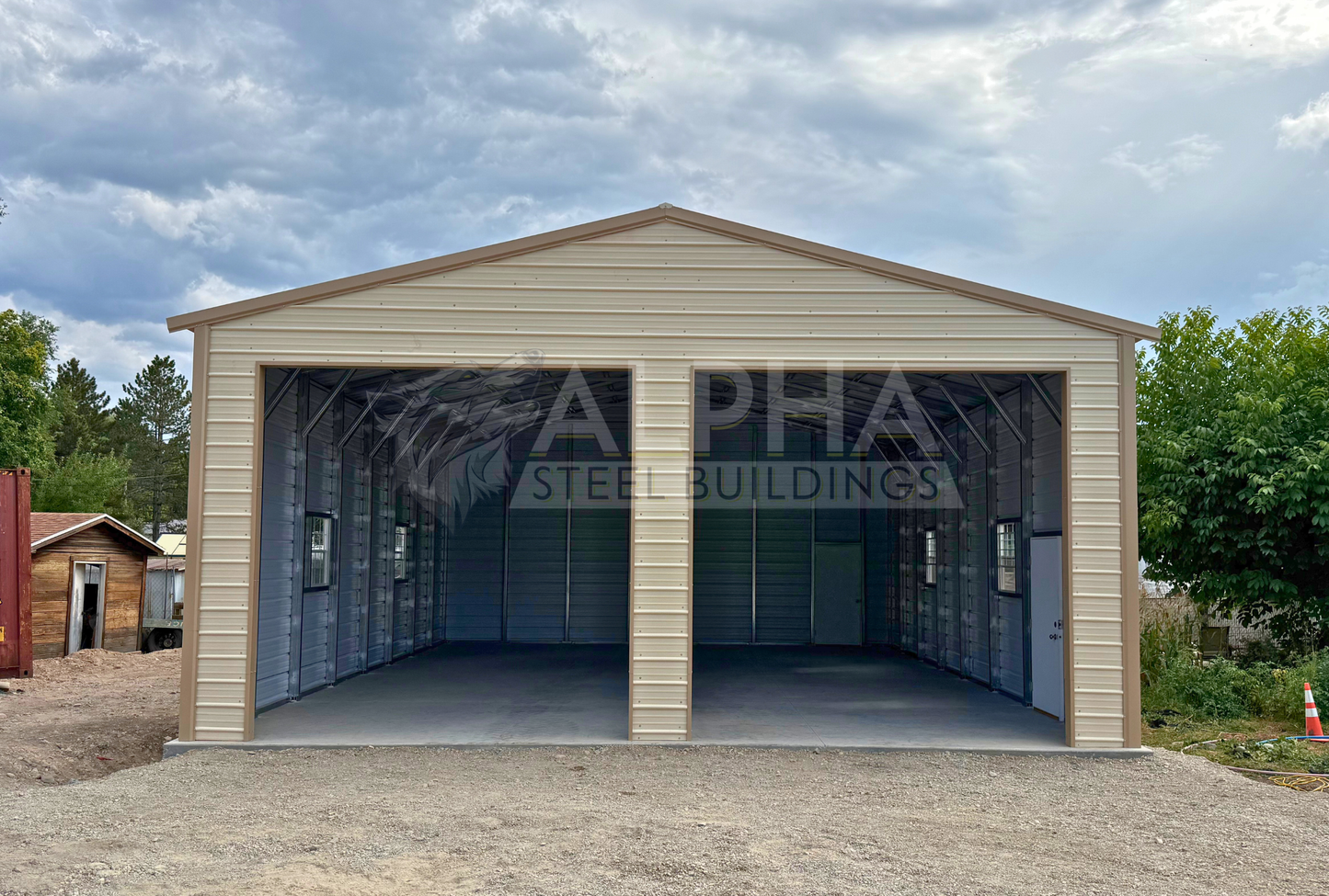 30x40x13 A-frame steel garage with vertical roof, (2) 12' x 12' overhead door frame outs on the end, horizontal panels and double leg posts, front view