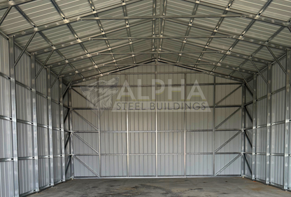 Internal back view of 30x45x16 a-frame steel shop with vertical roof, dual overhead door frame-outs, walk-in door, and closed vertical sides and ends.