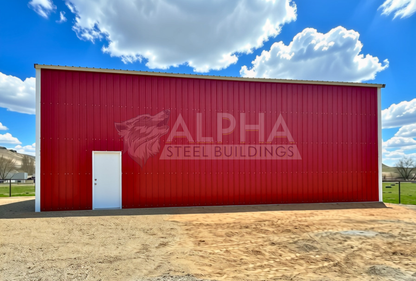 Right wide view of 30x45x16 a-frame steel shop with vertical roof, dual overhead door frame-outs, walk-in door, and closed vertical sides and ends.