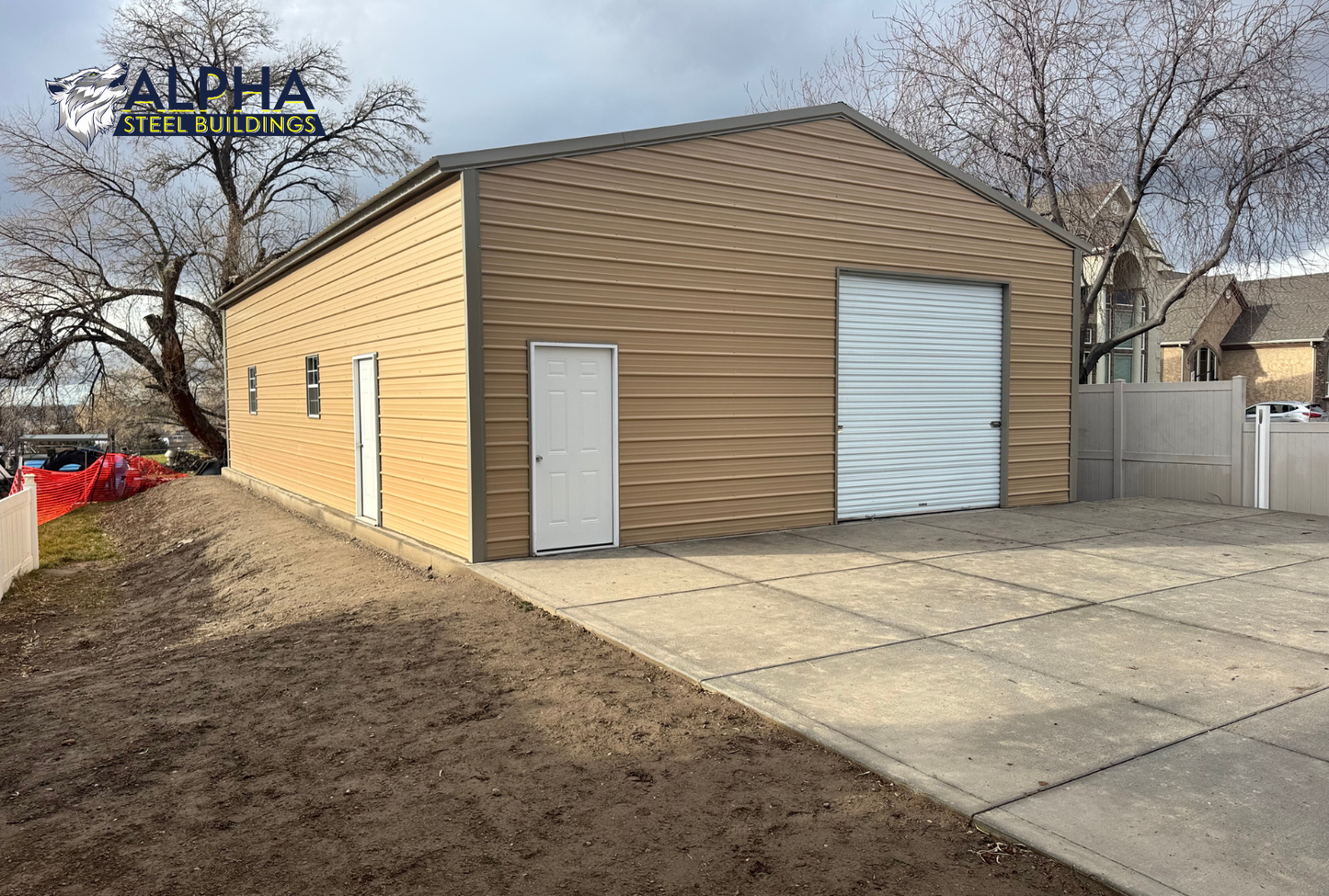 30x50 A-frame steel building with vertical roof, roll-up door, windows, and walk-in doors shown from front left angle
