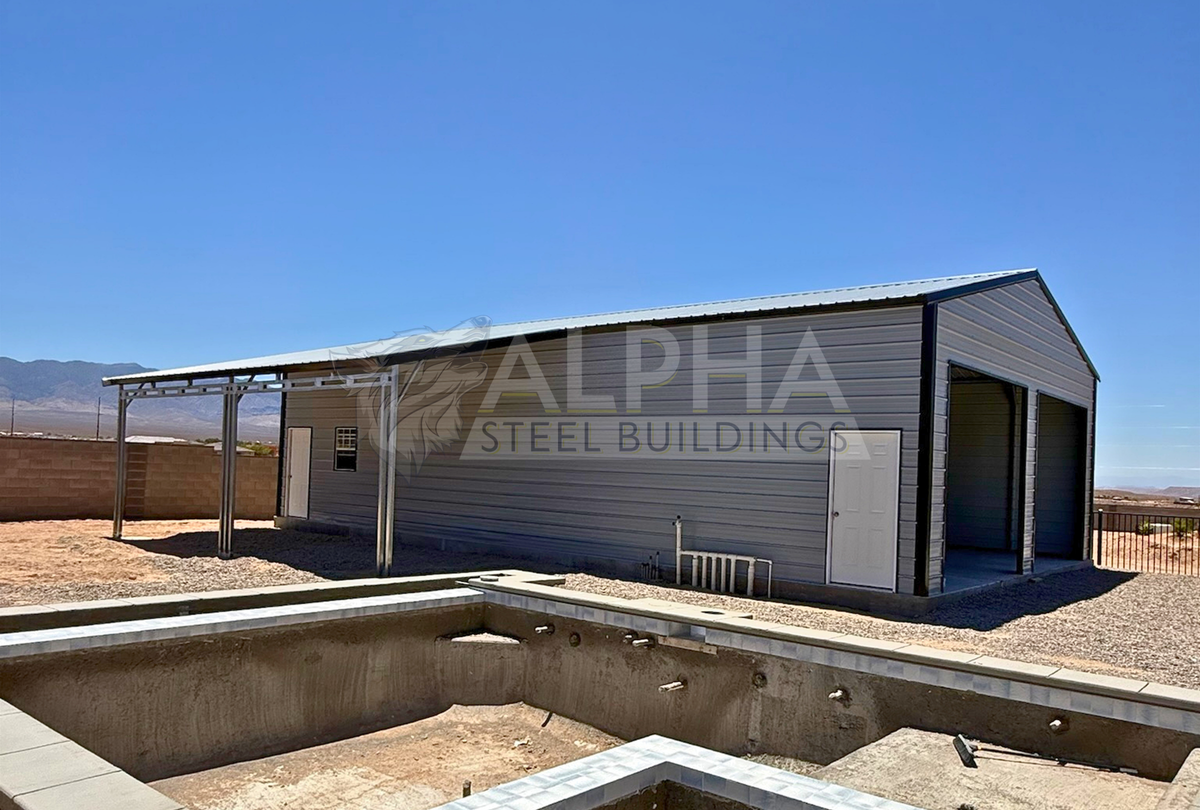 Exterior view of a 30'x50'x12' continuous roof barn style steel building with a 12'x30' attached lean-to, vertical roof, enclosed walls, overhead door openings, and walk-in doors.