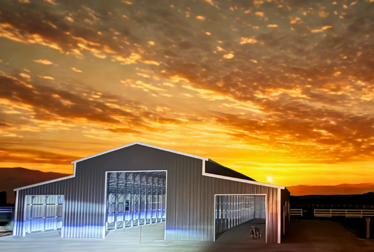 30x60 A-frame barn style steel building with 16-foot height, vertical roof, two 15-foot wide 60-foot long lean-tos, overhead doors, windows, and walk-in doors, engineered for 60 PSF ground snow load, front right side angled view.