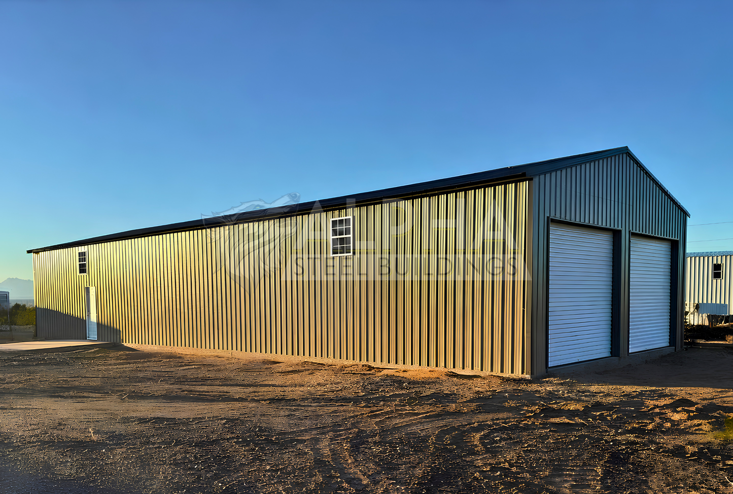 30x80x12 vertical roof steel building showing the front with two overhead doors and left side with walk-in door and windows