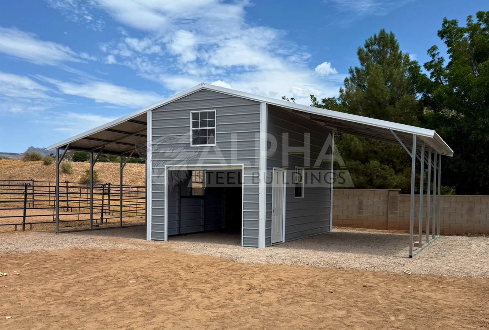 36'x20'x12'/9' continuous roof barn style steel building with enclosed center section and dual open lean-to wings.
