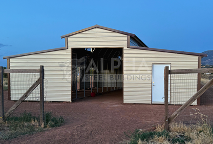 36x60x12 vertical roof steel barn with dual lean-tos and 10x10 frame-out, front view.