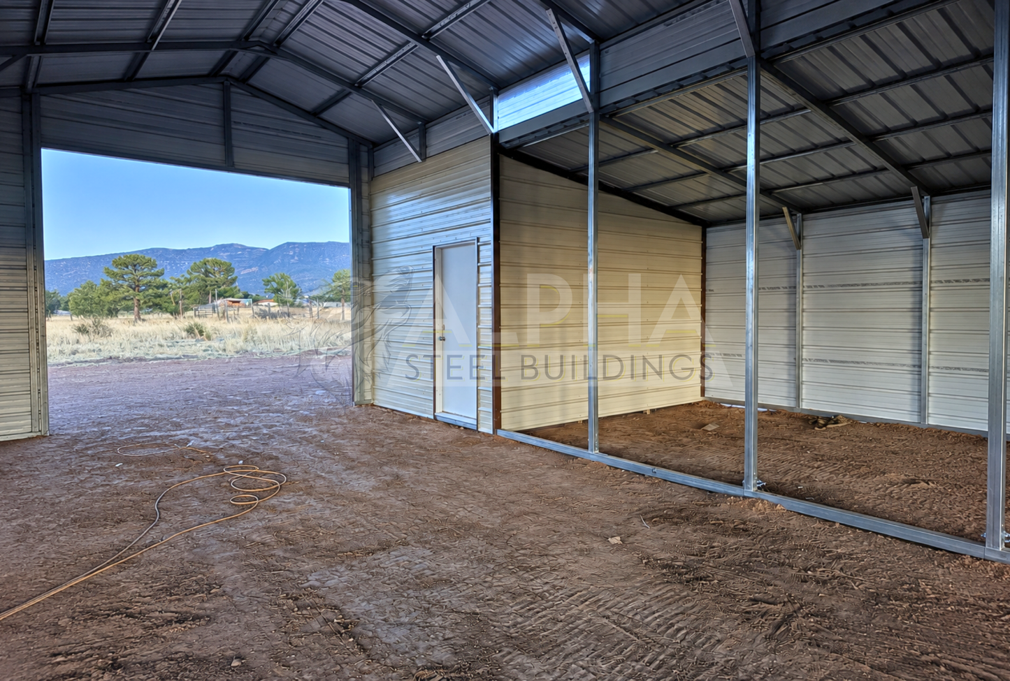 36x60x12 vertical roof steel barn with dual lean-tos and steel framing, interior view.