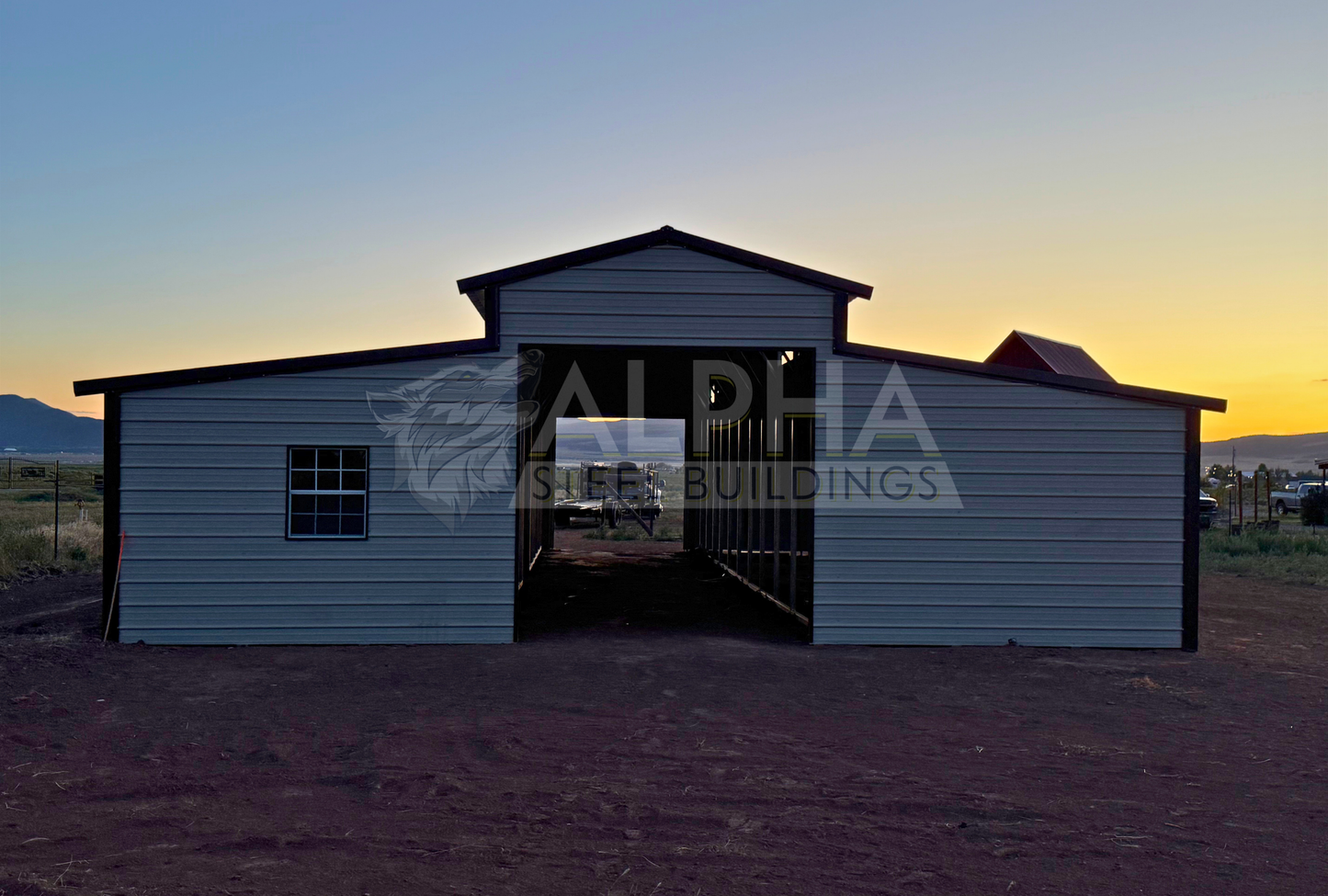 36x60x12 vertical roof steel barn with dual lean-tos and window opening, rear view