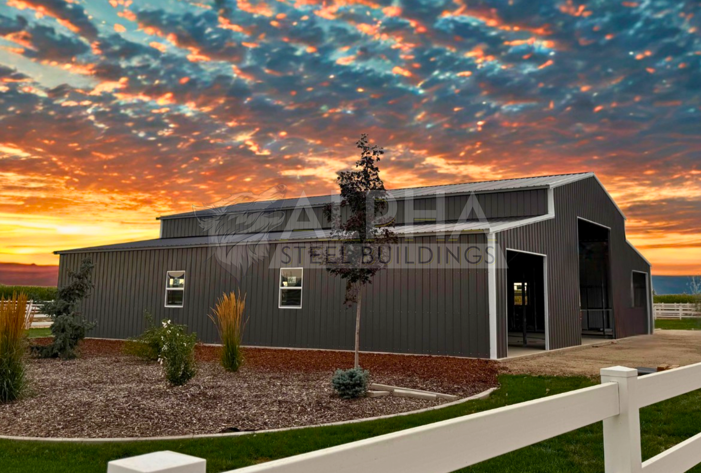 60x60x16/13-10 Barn Style A-frame steel building with vertical roof, dual lean-tos, vertical panels and multiple frame outs, front left angled view