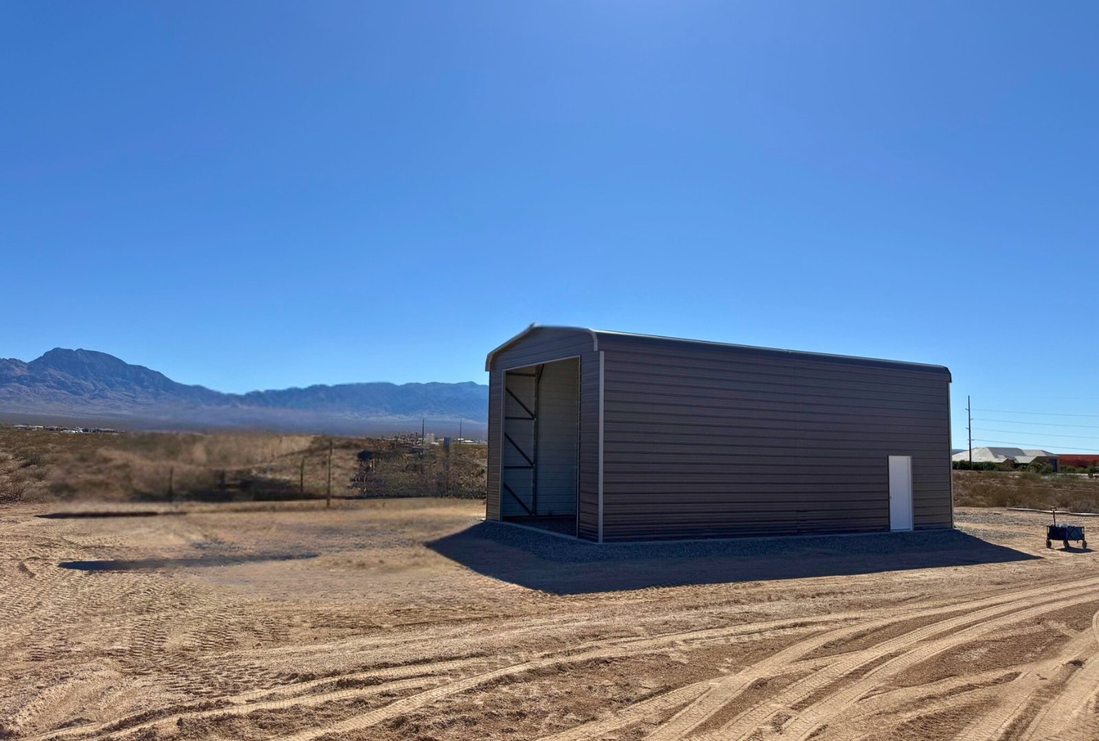 20x40 Regular Style steel building with 14-foot height, horizontal roof, closed right side panels, double leg posts, and diagonal bracing for added strength, engineered for 30 PSF ground snow load, right side exterior view.
