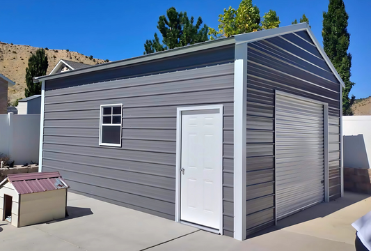 Front left view 18'x25'x10' f-frame vertical roof building with roll-up door, walk-in door, and window.