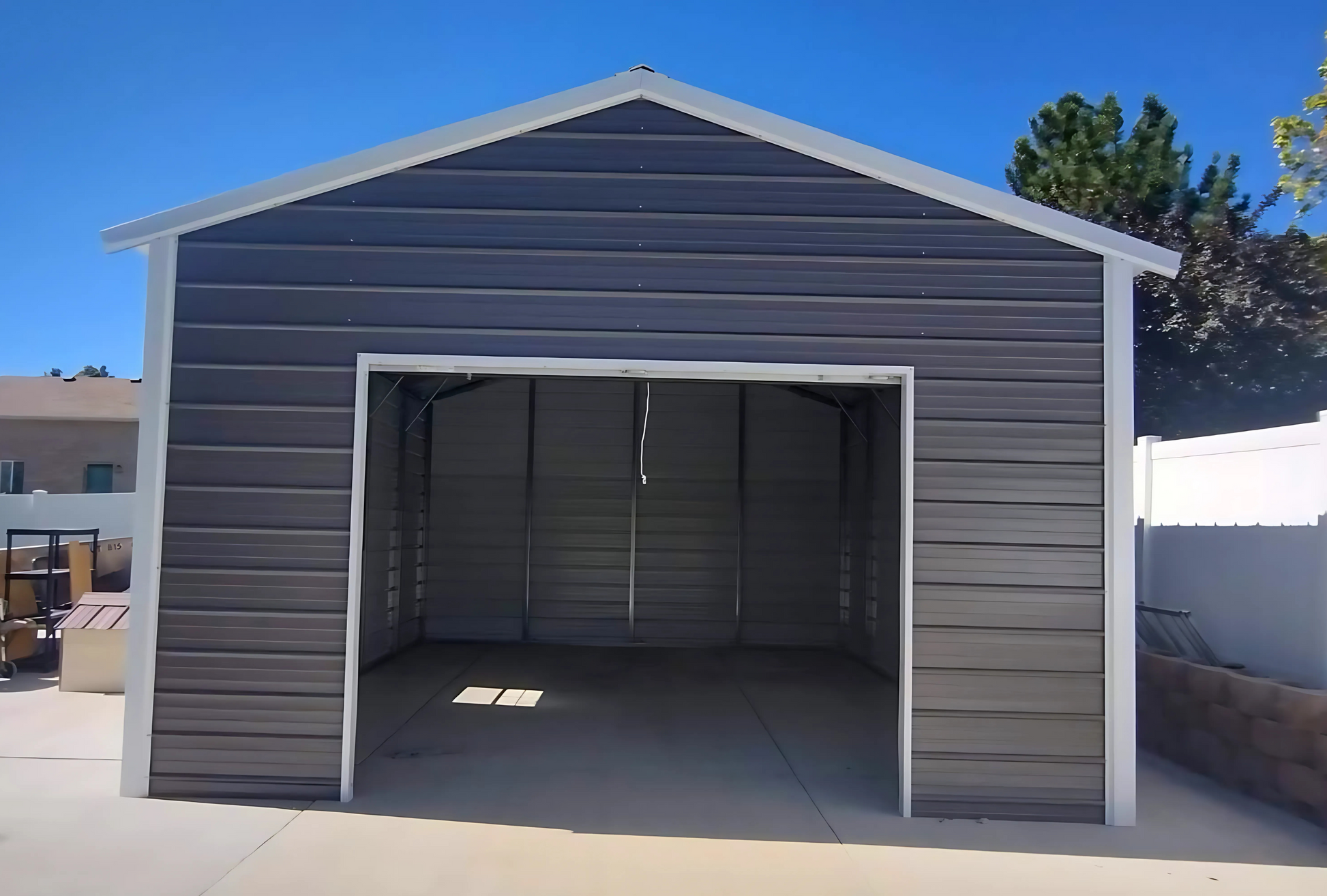 Front view 18'x25'x10' f-frame vertical roof building with roll-up door, walk-in door, and window.