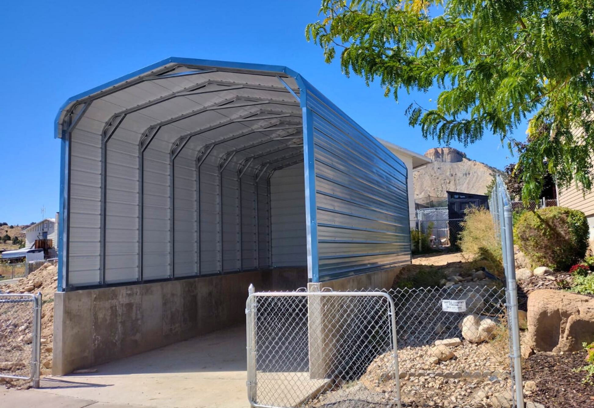 18'x25'x8' Regular Style Horizontal RV Cover - built on stem wall for extra height, closed on three sides, customized