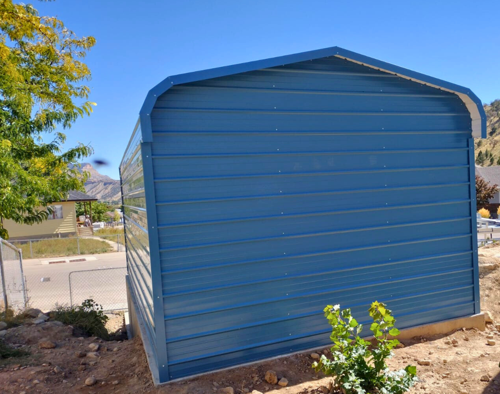 18'x25'x8' Regular Style Horizontal RV Cover - built on stem wall for extra height, closed on three sides, customized