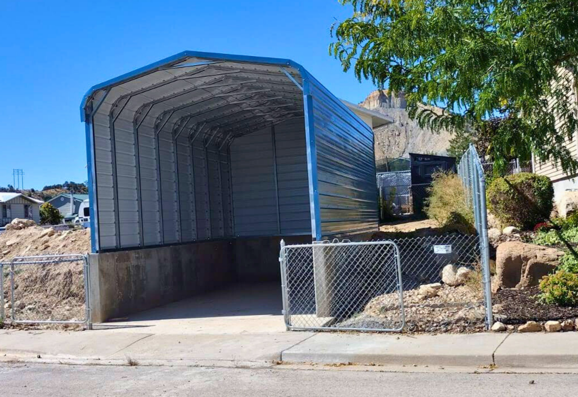 18'x25'x8' Regular Style Horizontal RV Cover - built on stem wall for extra height, closed on three sides, customized